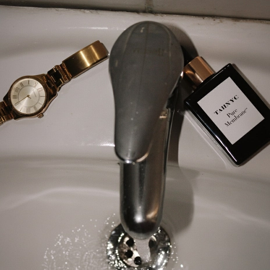 TAHNYC Pure Membrane hydration serum lifestyle image on denim background – The Pharmacy Lab