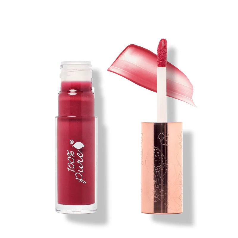 Lip gloss with applicator and '100% Pure' branding on a white background
