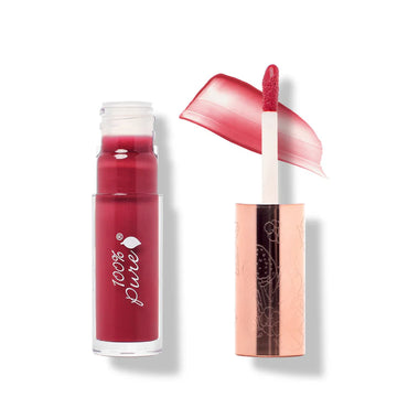 Lip gloss with applicator and '100% Pure' branding on a white background