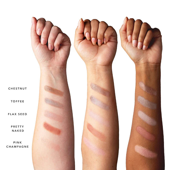 Three arms with makeup swatches labeled on a white background