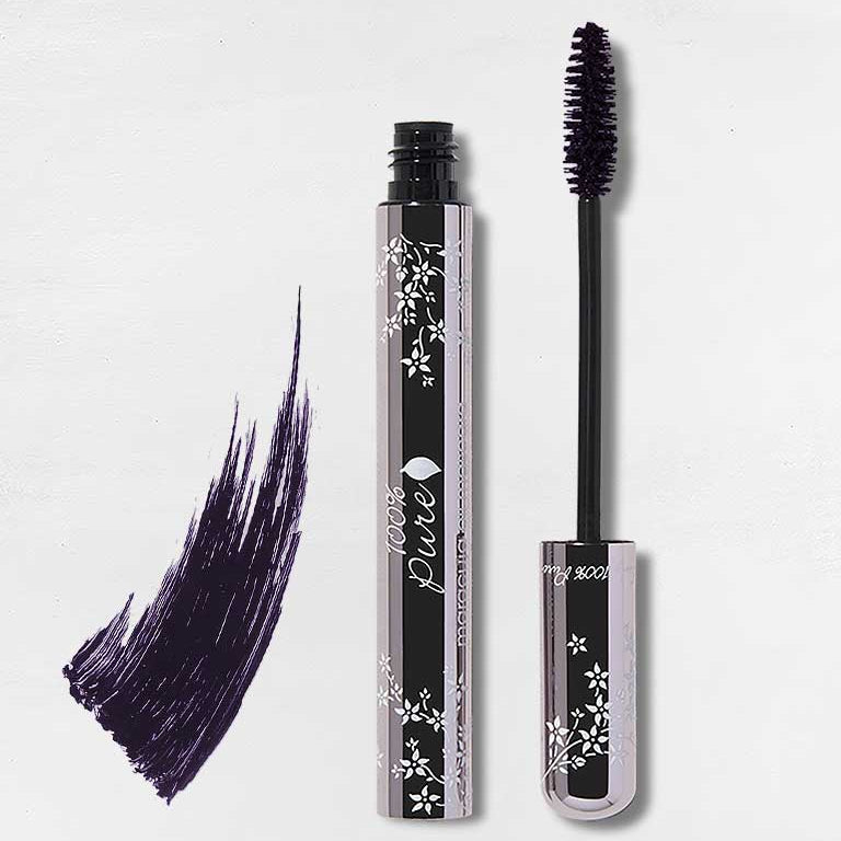 Blackberry mascara with packaging and brush on a light gray background