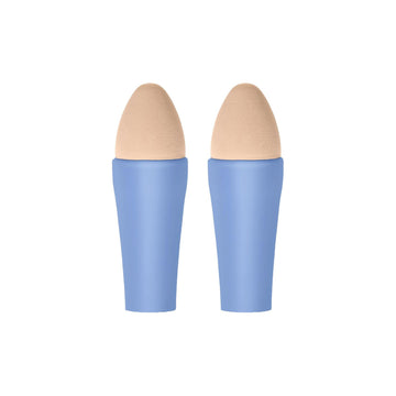 Two makeup sponge applicators with beige nubs and light blue handles, shown side-by-side on a plain white background.