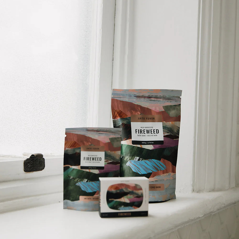 Fireweed packaging on a windowsill with white curtains in the background