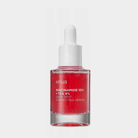 Red serum bottle with white cap on a light gray background