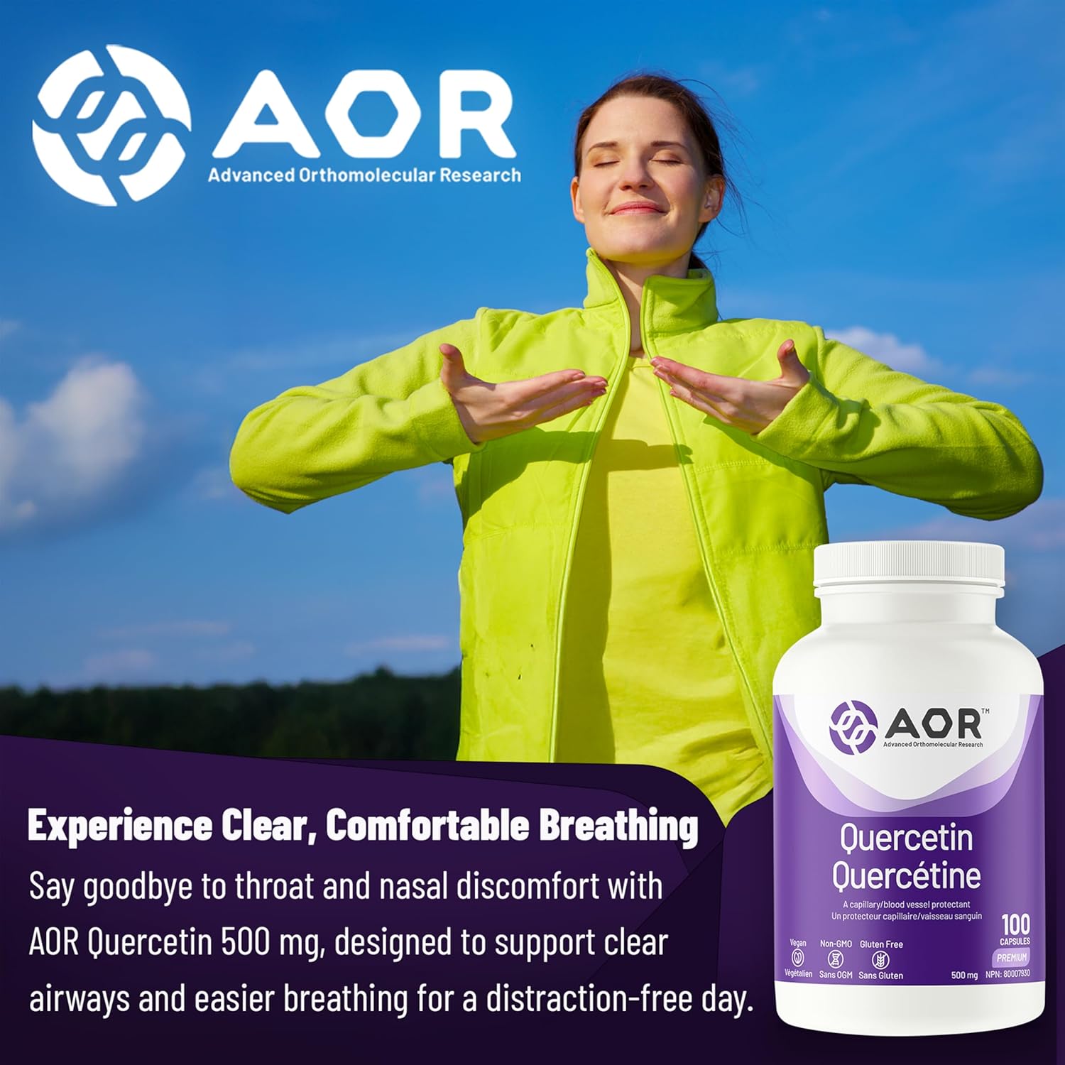 Woman in a bright yellow jacket with AOR Quercetin supplement bottle against a blue sky.