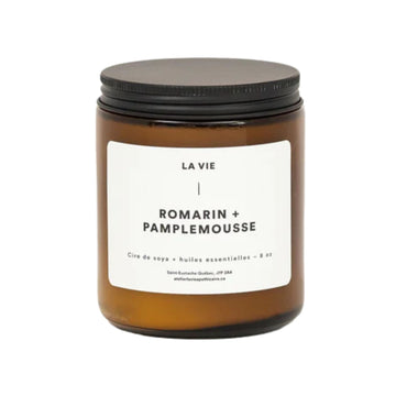 Candle jar with a label on a white background