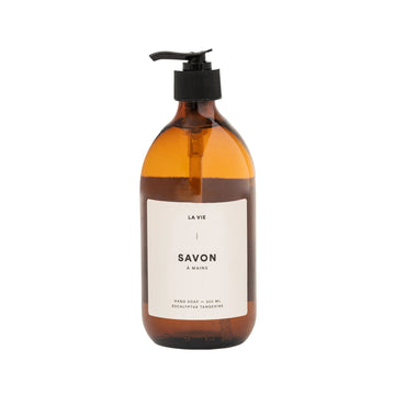 Brown soap bottle with pump and 'La Vie' label on a white background