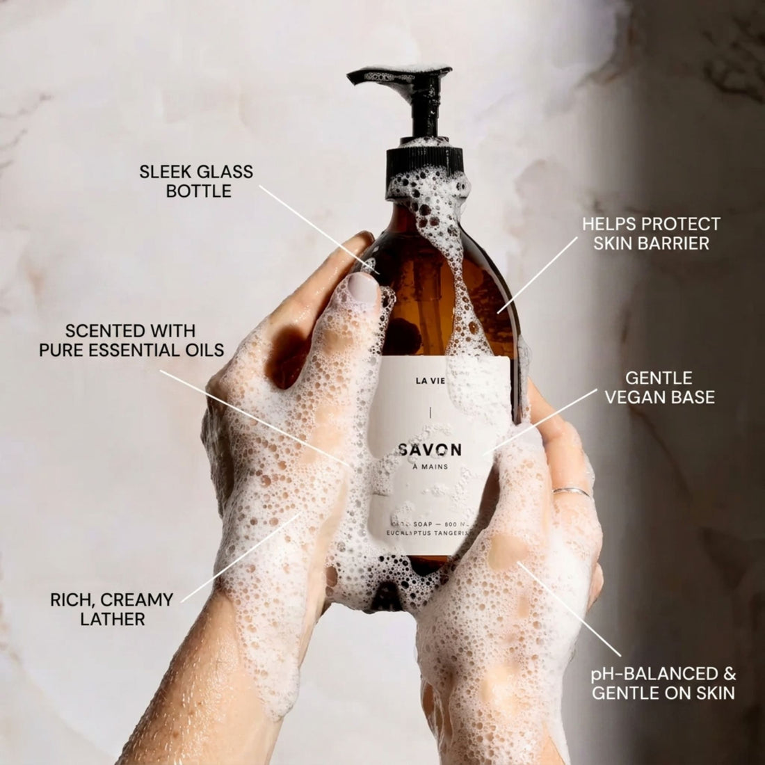Brown soap bottle with pump and 'La Vie' label on a white background