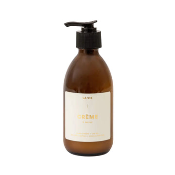 Atelier La Vie Apothicaire hand cream in amber pump bottle on a white background