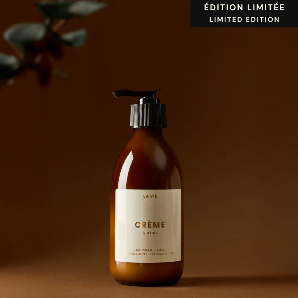 Atelier La Vie Apothicaire limited edition hand cream in amber pump bottle with warm, minimal studio background