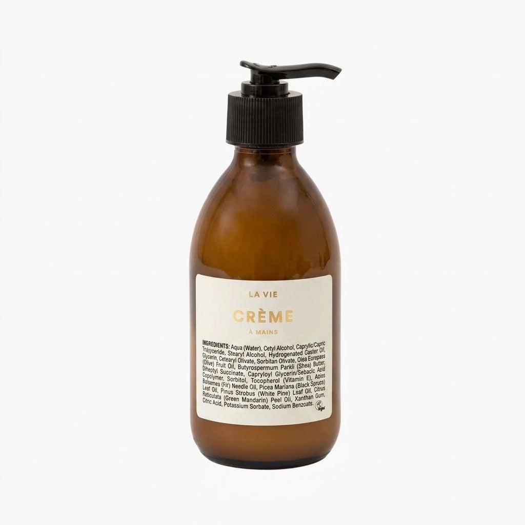 Atelier La Vie Apothicaire hand cream in amber pump bottle on a white background