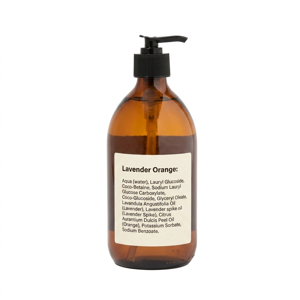 Amber glass bottle with pump and label on a white background
