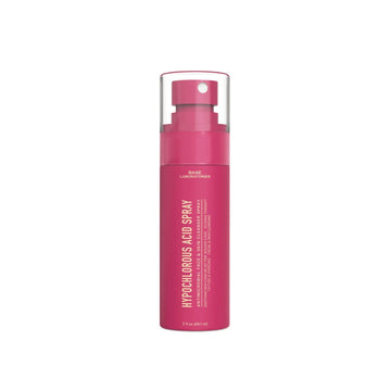 A pink spray bottle of Hypochlorous Acid Spray on a plain white background.