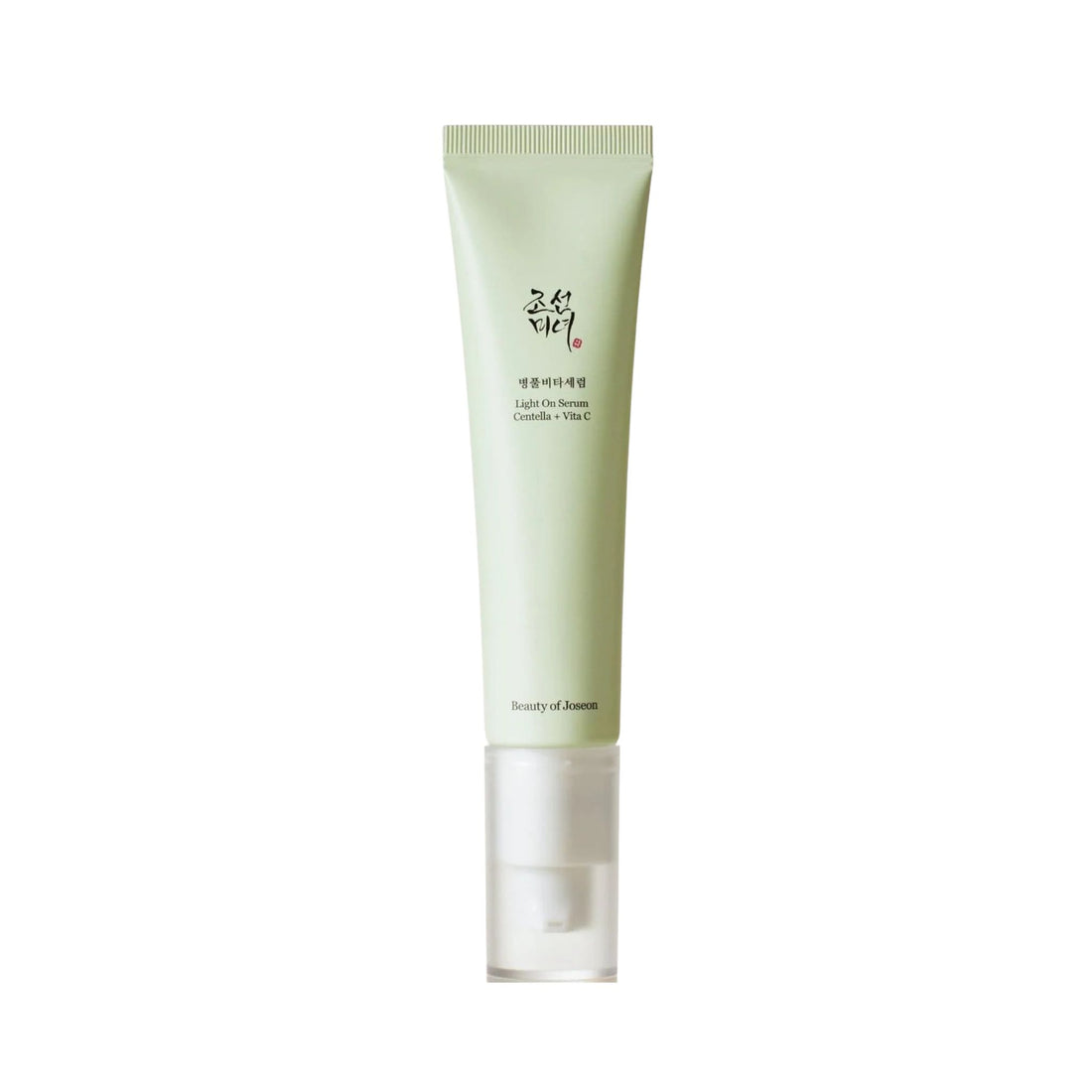 Skincare tube with green label on a white background