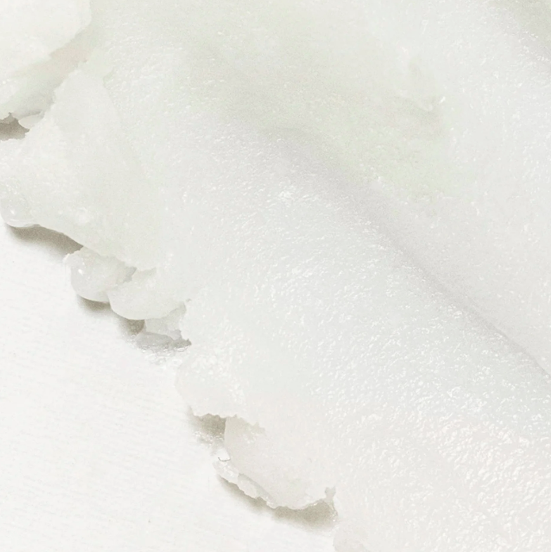 Close-up of white textured fabric with ruffled edge