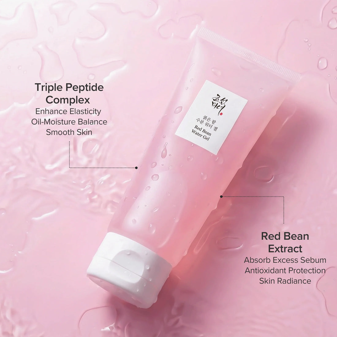 Pink and white tube of skincare product on a white background