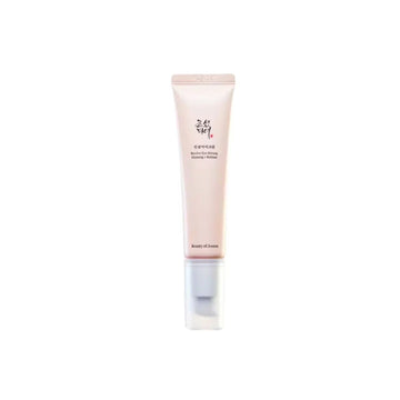 Skincare tube with visible brand name on a white background