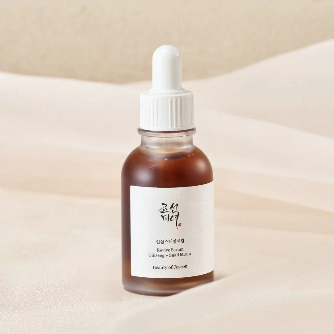 Skincare serum bottle with dropper on a beige background