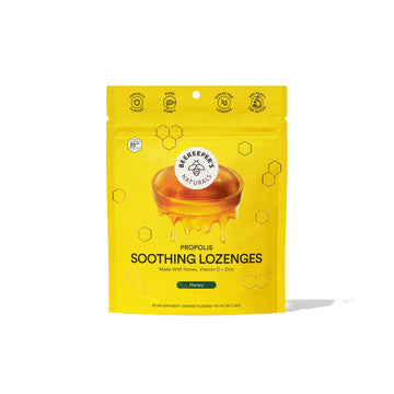 A yellow stand-up pouch of Beekeepers Naturals Propolis Soothing Lozenges, featuring a honey dip graphic and honeycomb patterns on a white background.