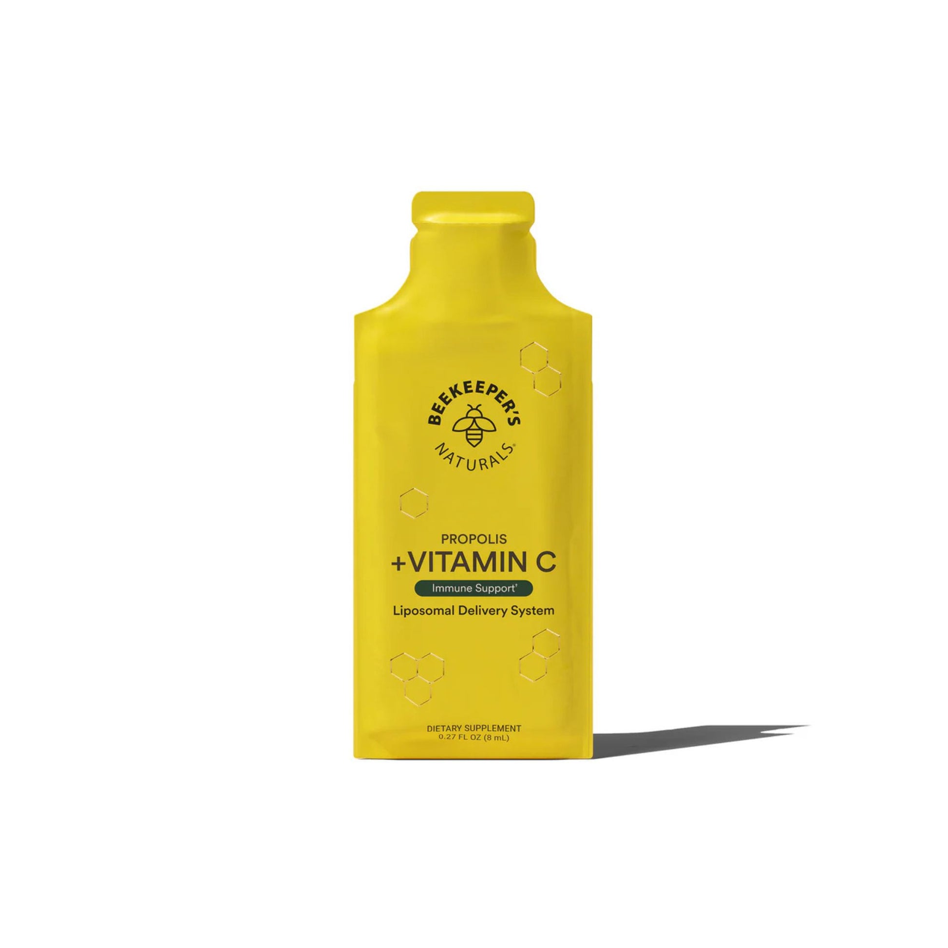 A bright yellow single-serve pouch of Be Keeps Pure Naturals Propolis + Vitamin C dietary supplement, shown on a clean white background with a soft shadow.