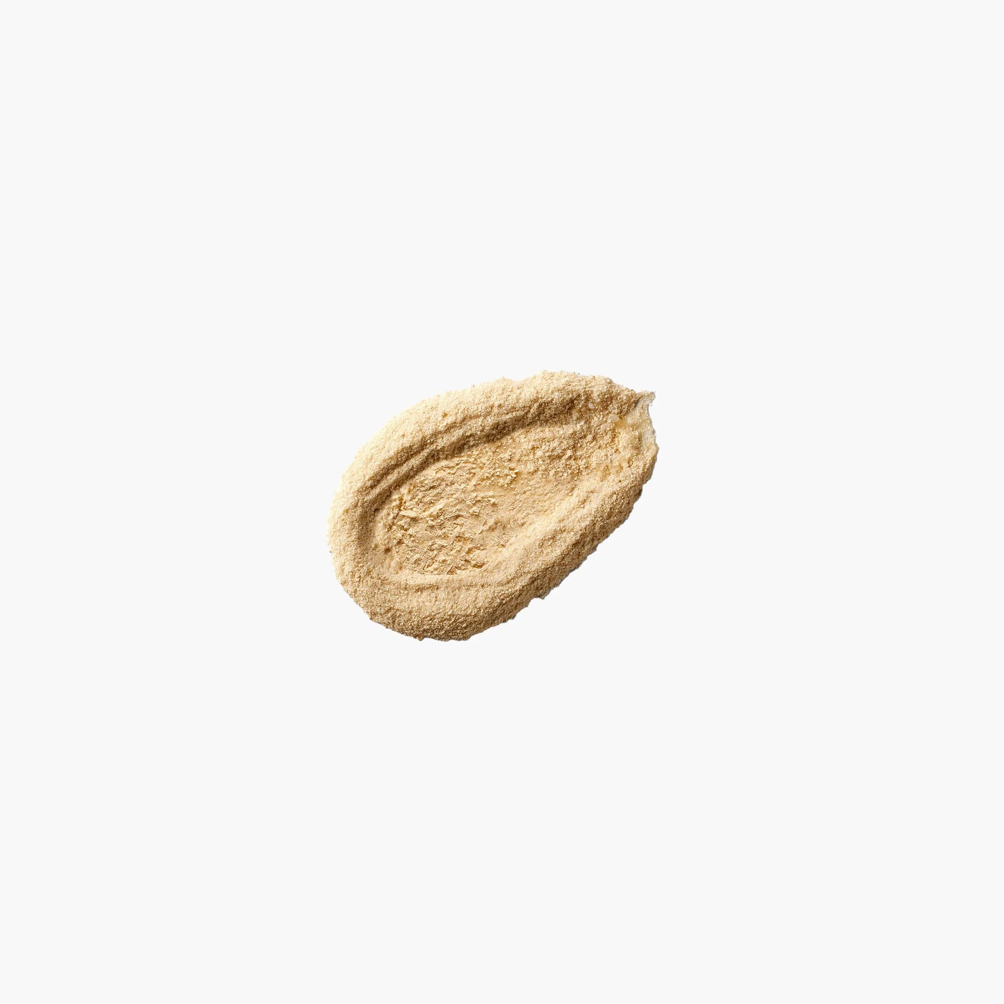 Beige cosmetic cream swatch on a white background