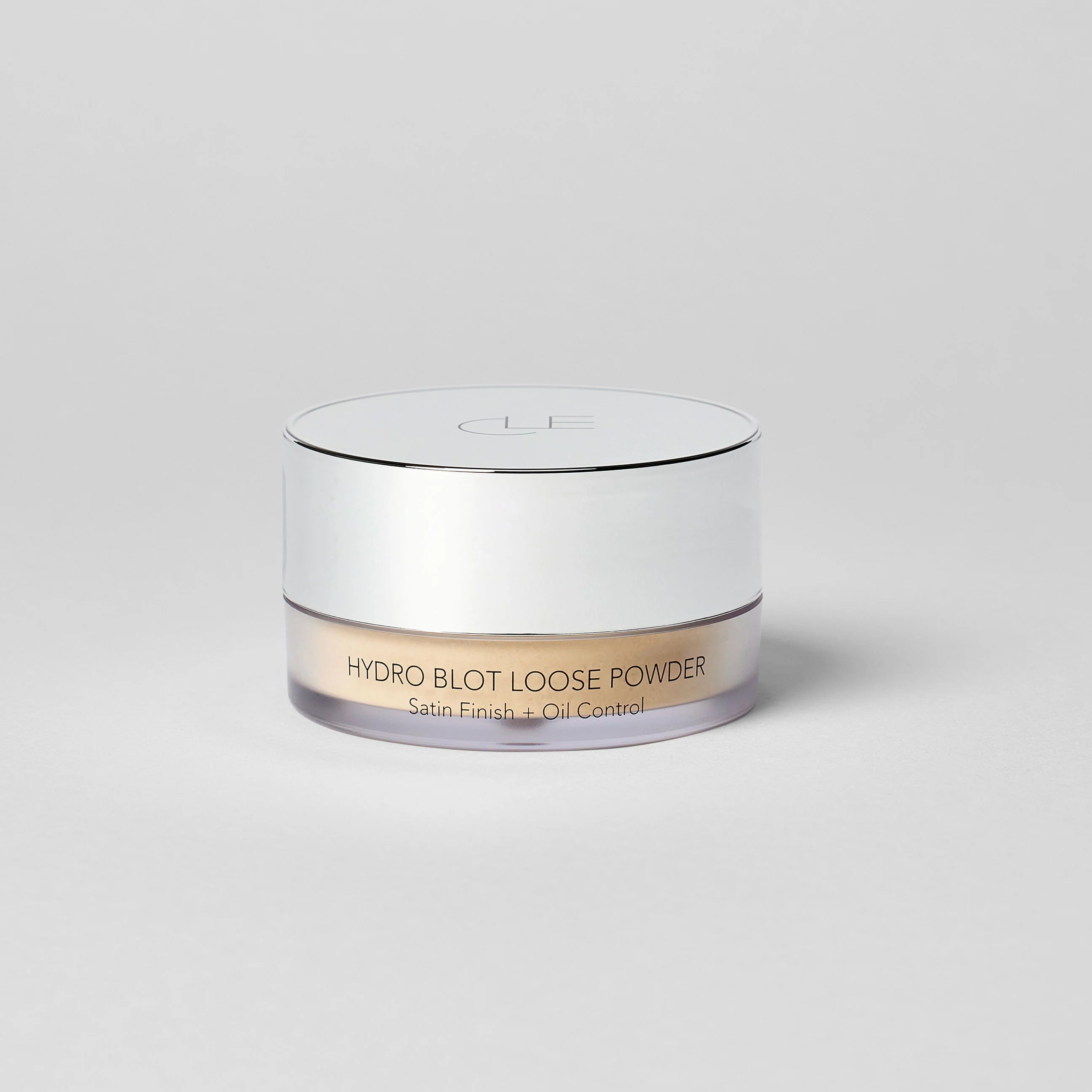Hydro Blot Loose Powder container on a light gray background