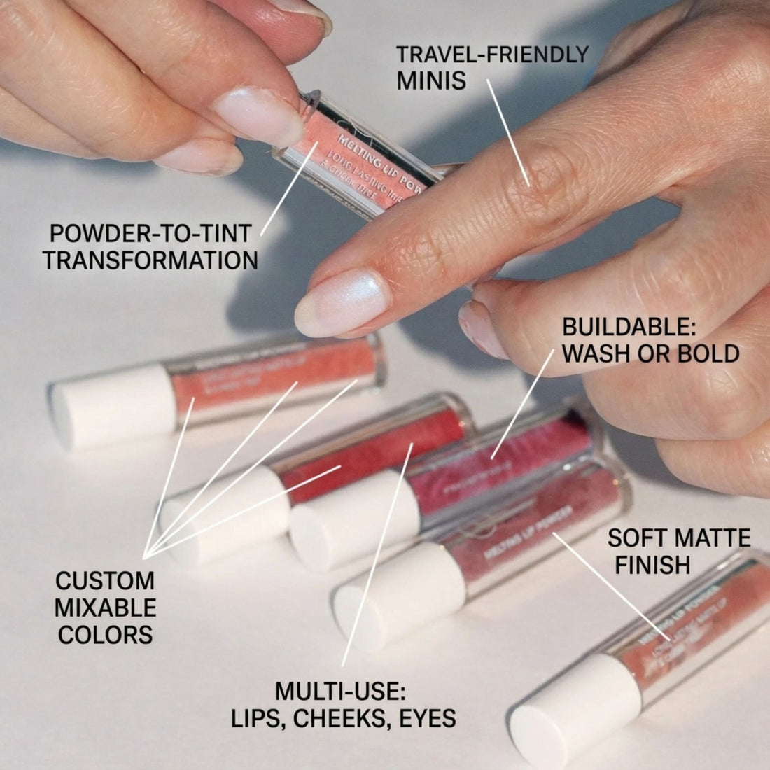 Set of five lip glosses in a white box with a brand logo on a white background