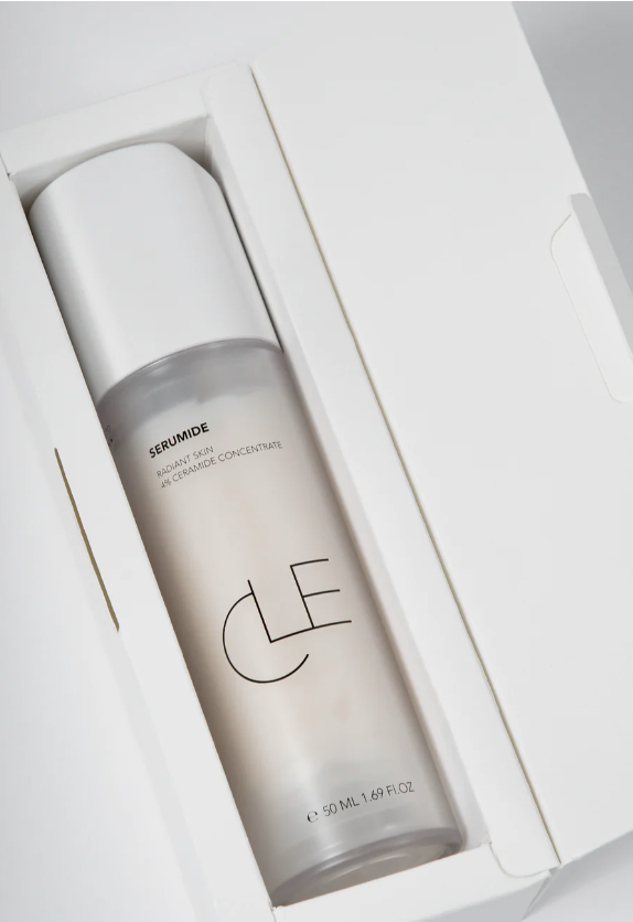 CLE serum bottle in a white box on a light background