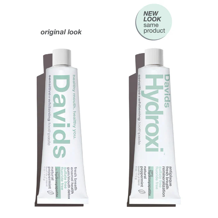 Two toothpaste tubes labeled 'Davids' and 'Hydroxi' side by side with text indicating a new look for the same product.
