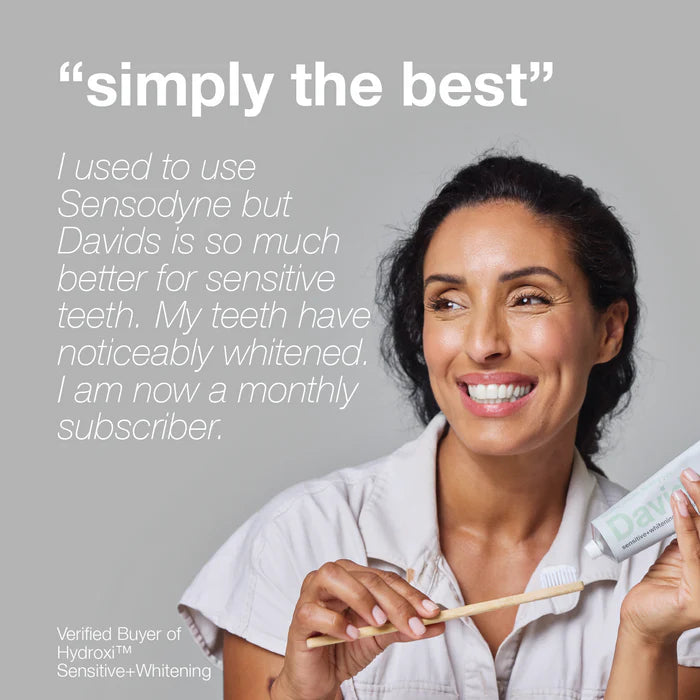 Woman holding a toothbrush and toothpaste with text about Sensodyne and David's products on a gray background