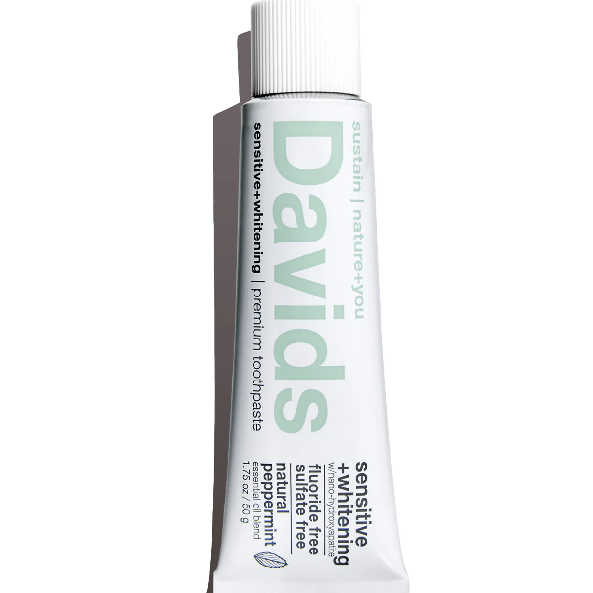 Tube of Davids sensitive whitening toothpaste on a white background
