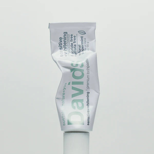 Davids toothpaste tube on a light gray background