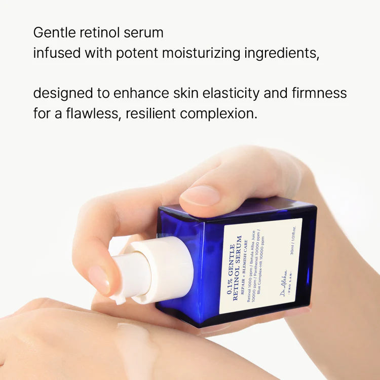 Hand holding a blue skincare serum bottle with text about gentle retinol serum.