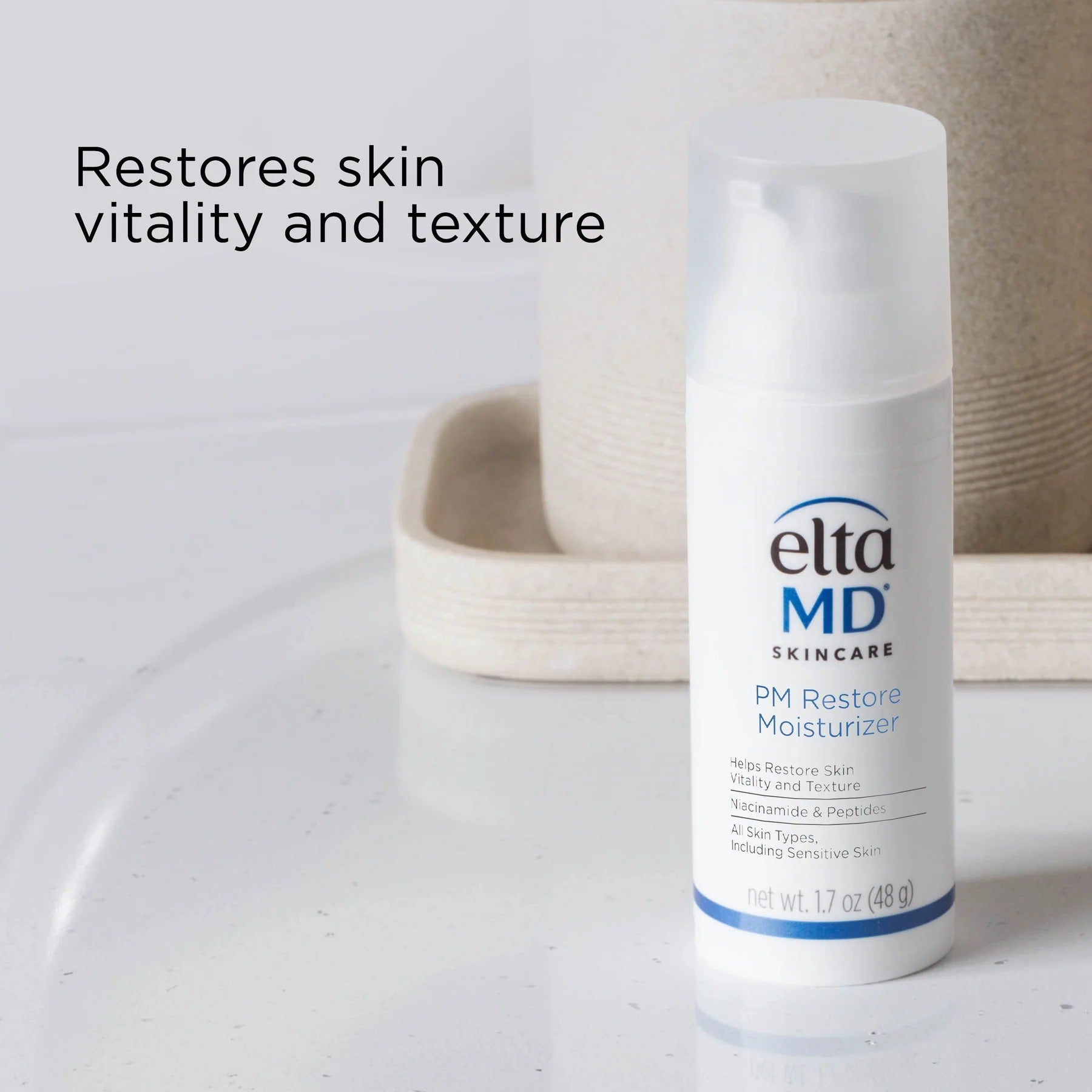 Eltamd skincare moisturizer bottle on a bathroom counter with text 'Restores skin vitality and texture'.