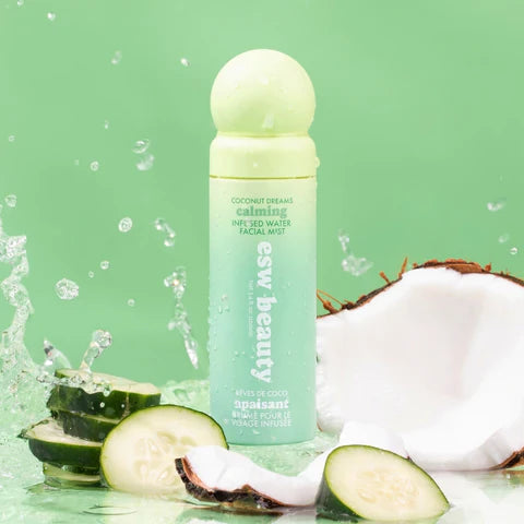 ESW Beauty Coconut Dreams Calming Infused Water Facial Mist from The Pharmacy Lab styled with cucumber, coconut, and water splashes to highlight a refreshing, soothing facial mist.