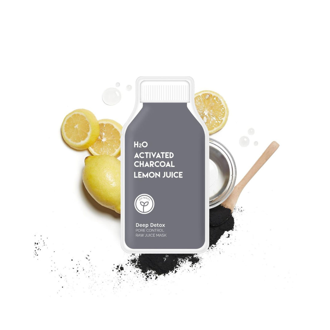 A H2O Activated Charcoal Lemon Juice deep detox hair mask sachet, styled with fresh lemons, black activated charcoal powder, and a wooden spoon on a white background.