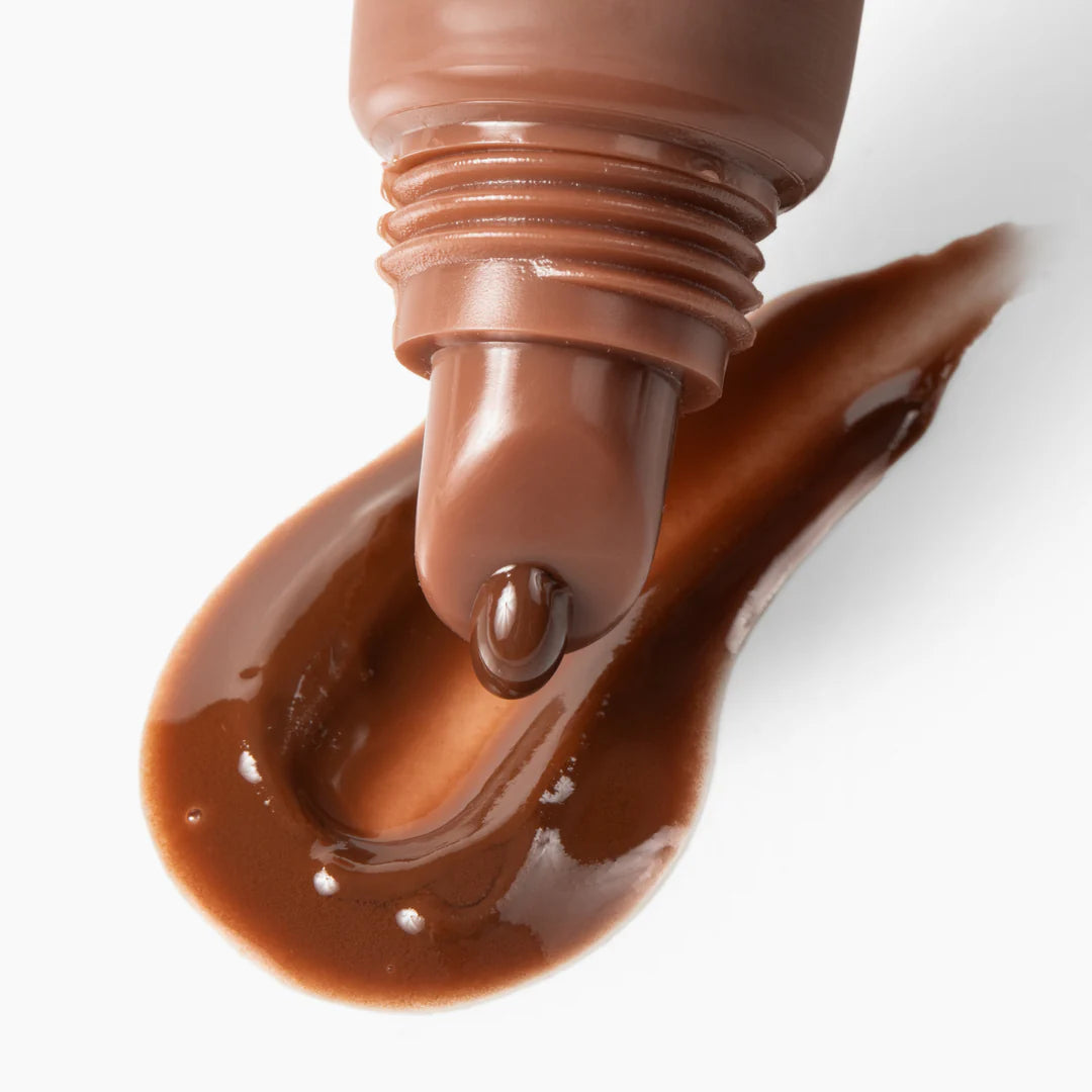 Close-up texture of ESW Beauty Mocha Coffee Smoothie Lip Treatment highlighting rich, glossy formula from The Pharmacy Lab.
