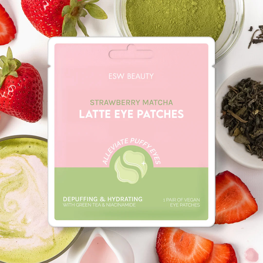 The Pharmacy Lab ESW Beauty Strawberry Matcha Latte Eye Patches flat lay with strawberries, matcha powder, and green tea ingredients