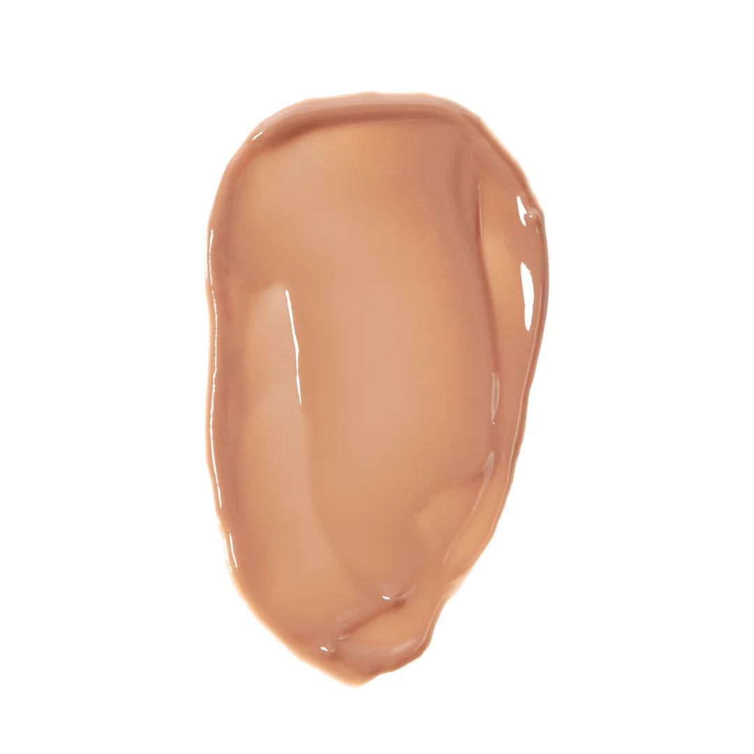 Vanilla Almond Butter Smoothie lip balm with a swatch of lip color on a white background