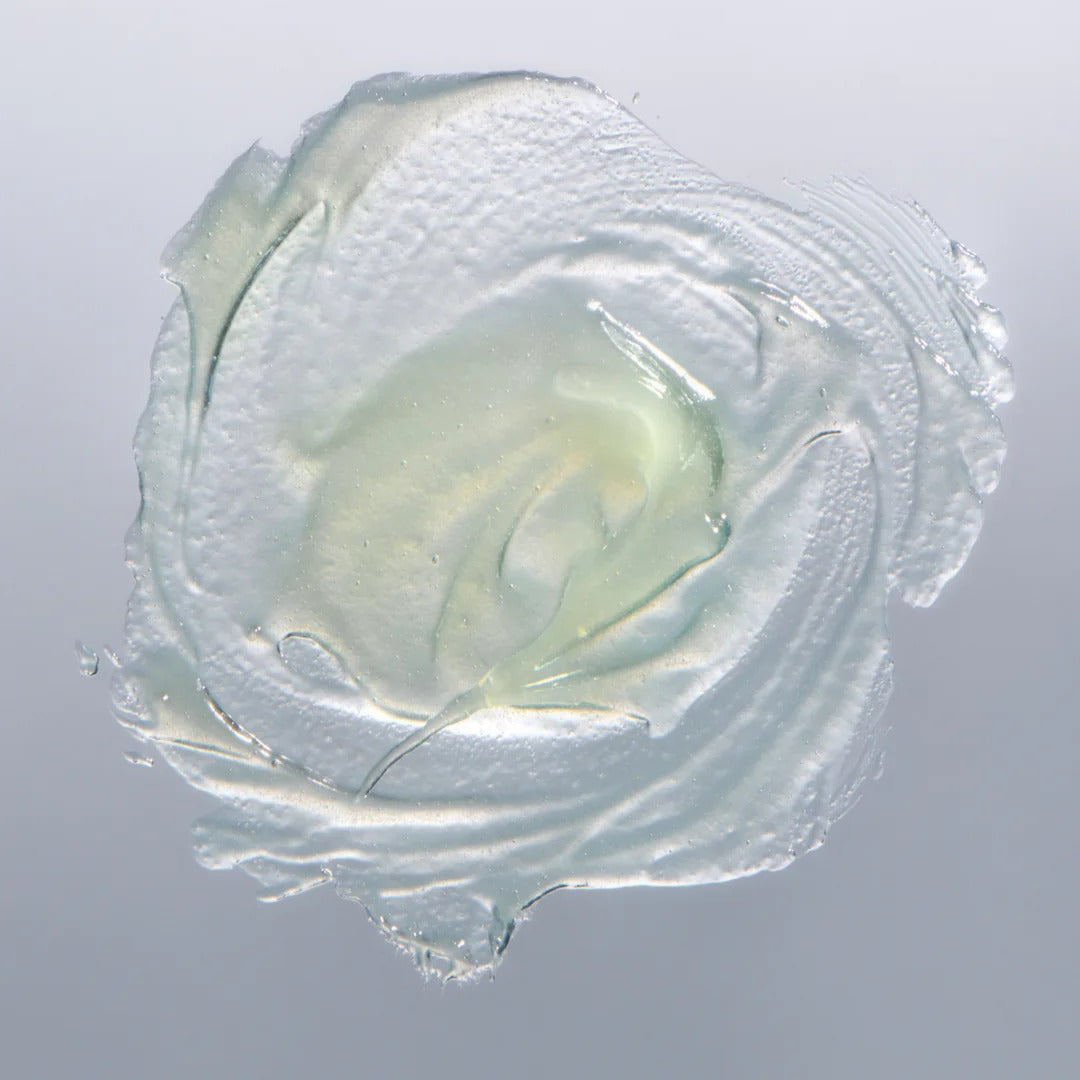 Clear gel-like substance on a gray background