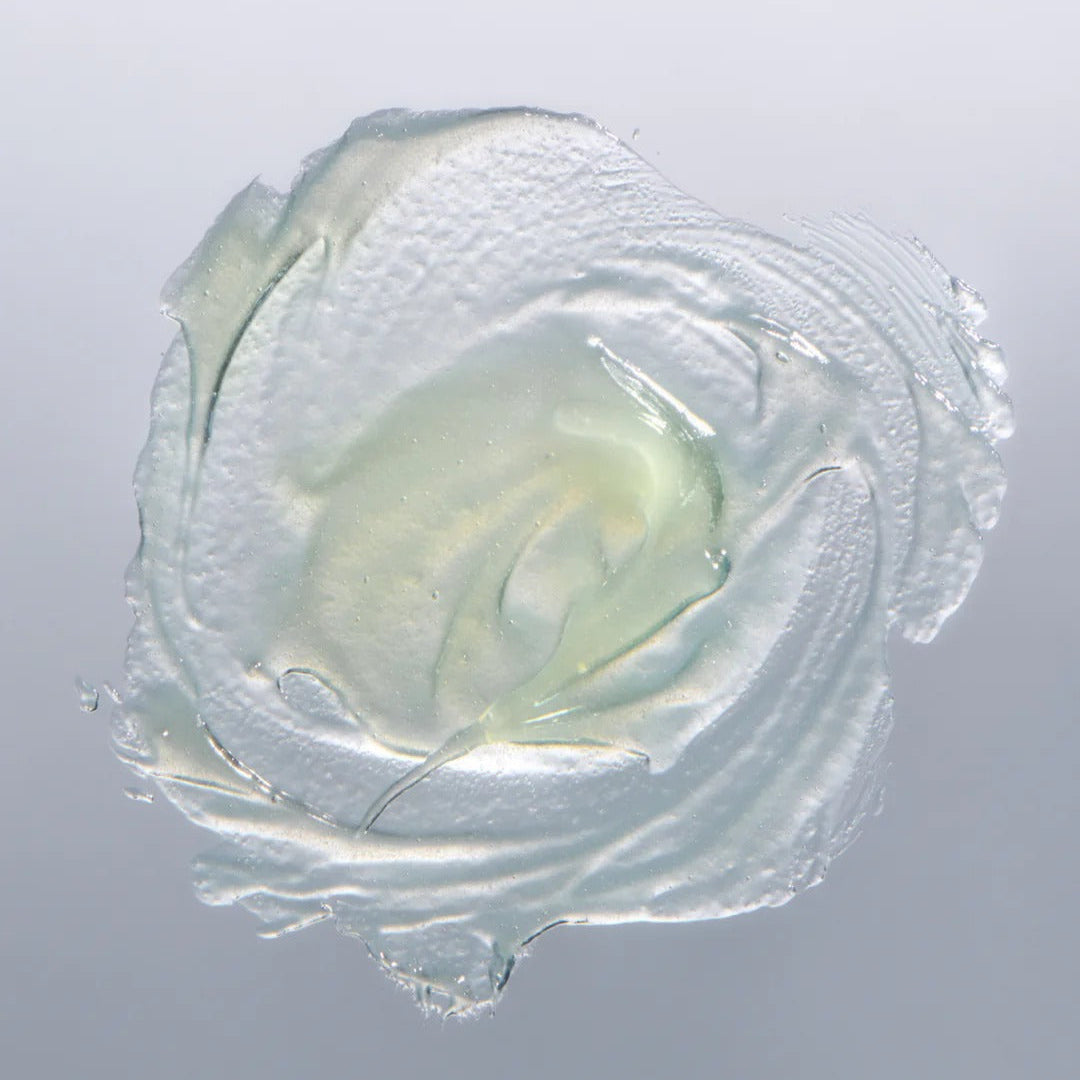 Clear gel-like substance on a gray background