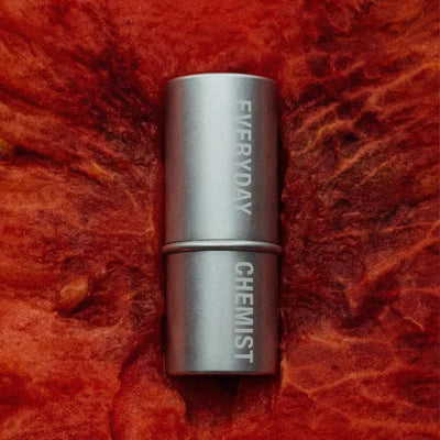 Silver cylindrical container with 'Everyday Chemist' branding on a white background