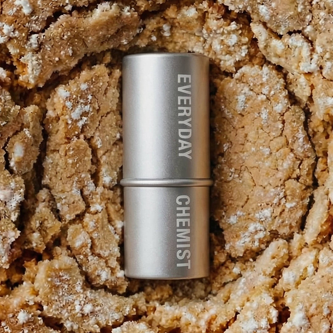 Silver cylindrical container with 'Everyday Chemist' branding on a white background
