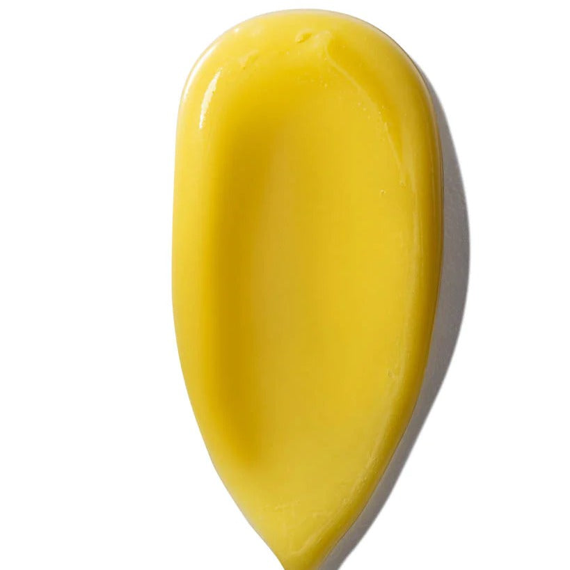 Skincare bottle with wooden cap on a white background