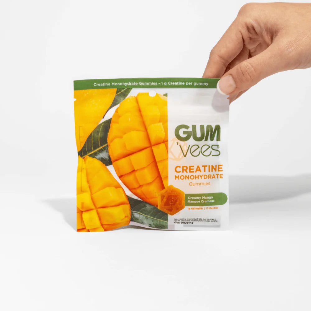 Gumvees Creatine Monohydrate gummies packaging with a hand holding it on a white background