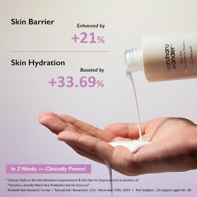 Hand holding a bottle of skincare product with text on skin barrier and hydration enhancement.