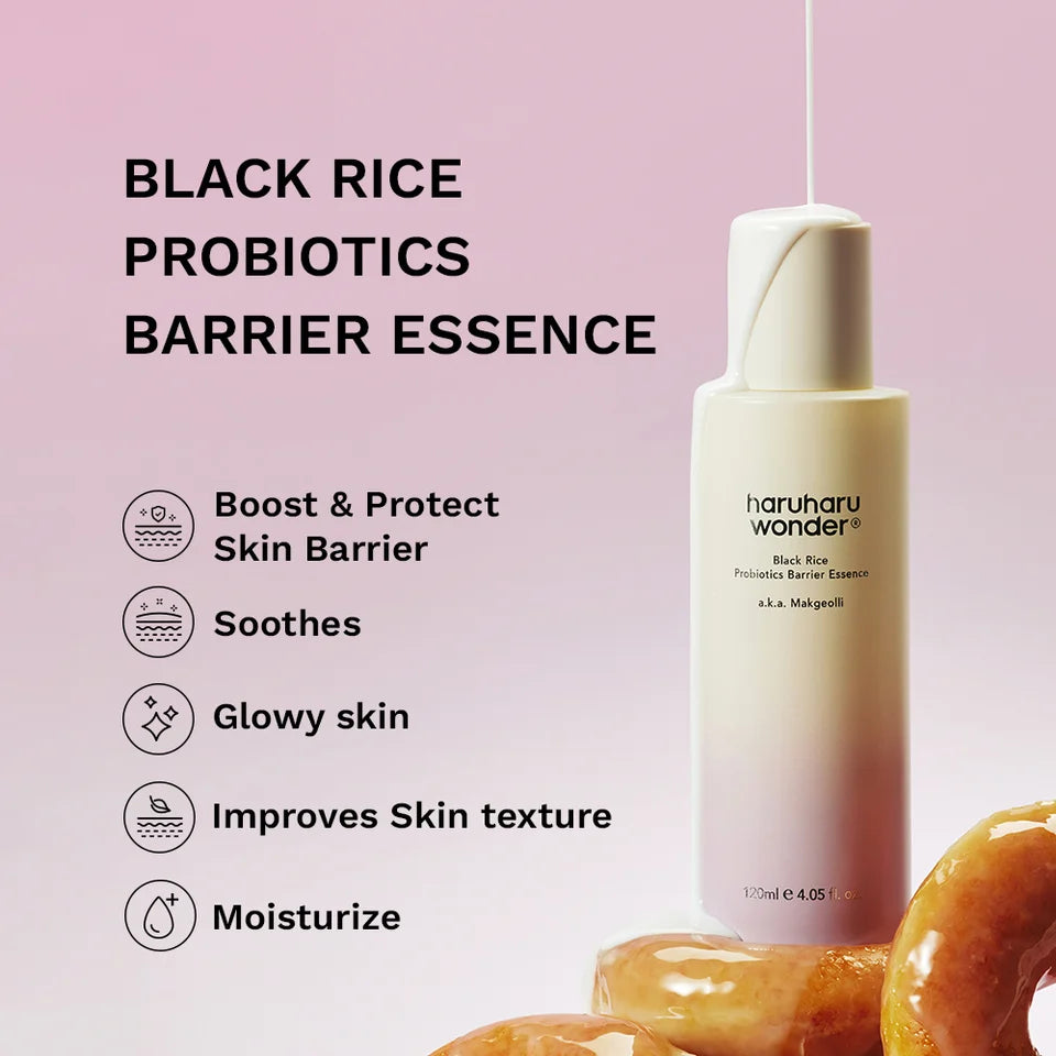 Haruhu wonder black rice probiotics barrier essence bottle with donuts on a pink background