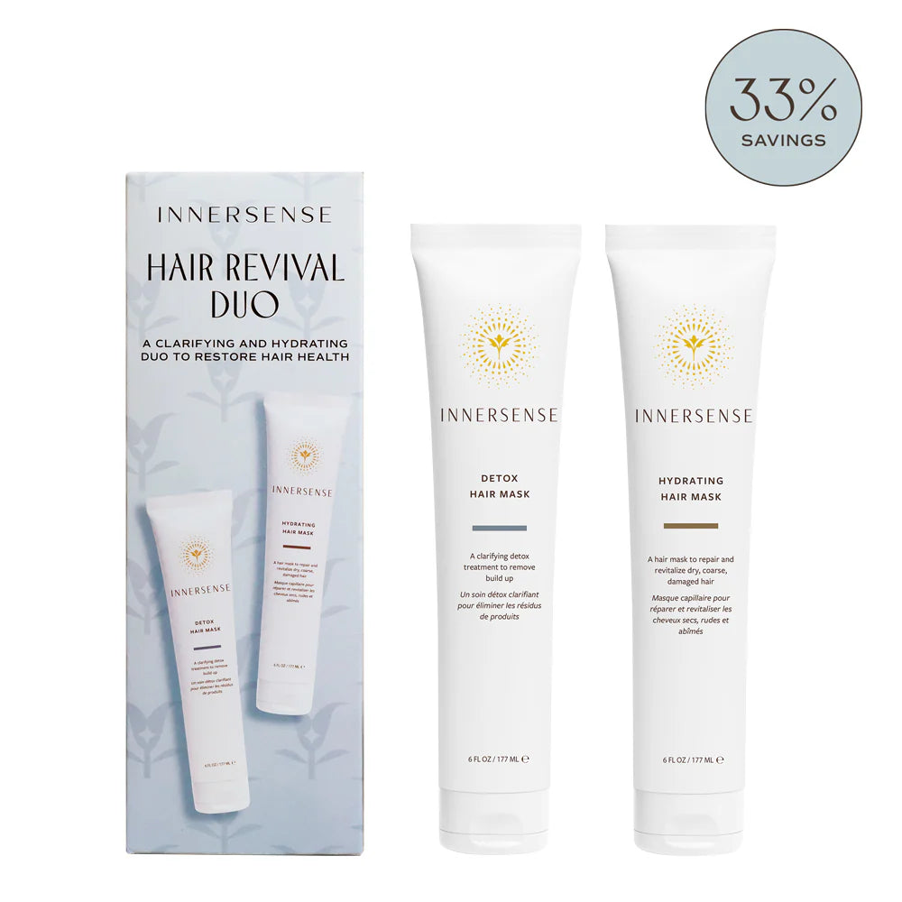 Two Innersense hair mask bottles on a white background