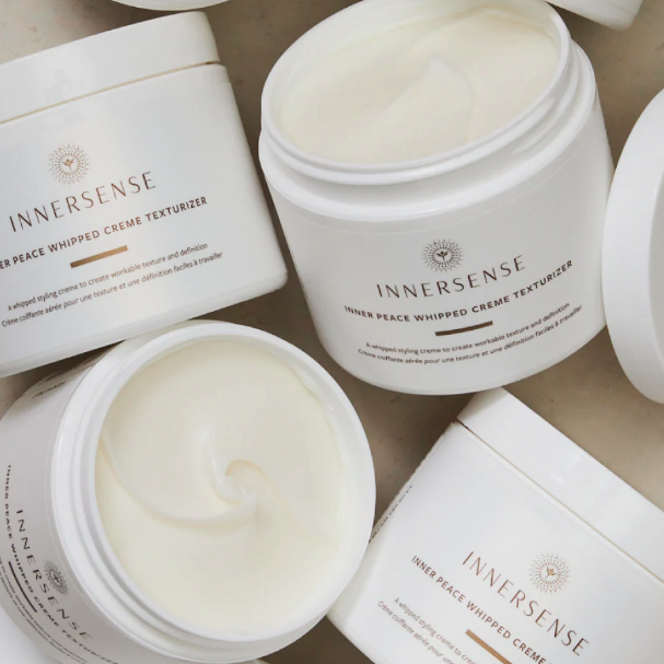 Innersense whipped crème texturizer jars on a light background