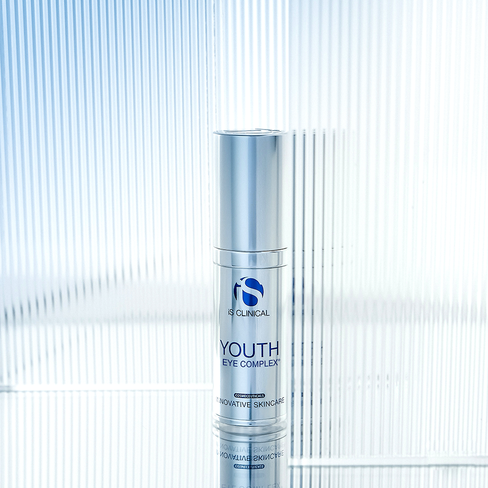 Skincare bottle labeled 'Youth' against a light blue background